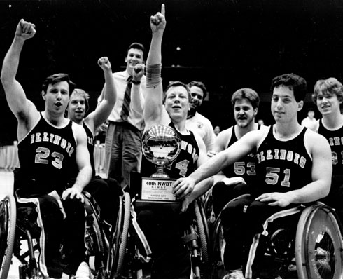1988 NCAA champion wheelchair basketball team holding trophy